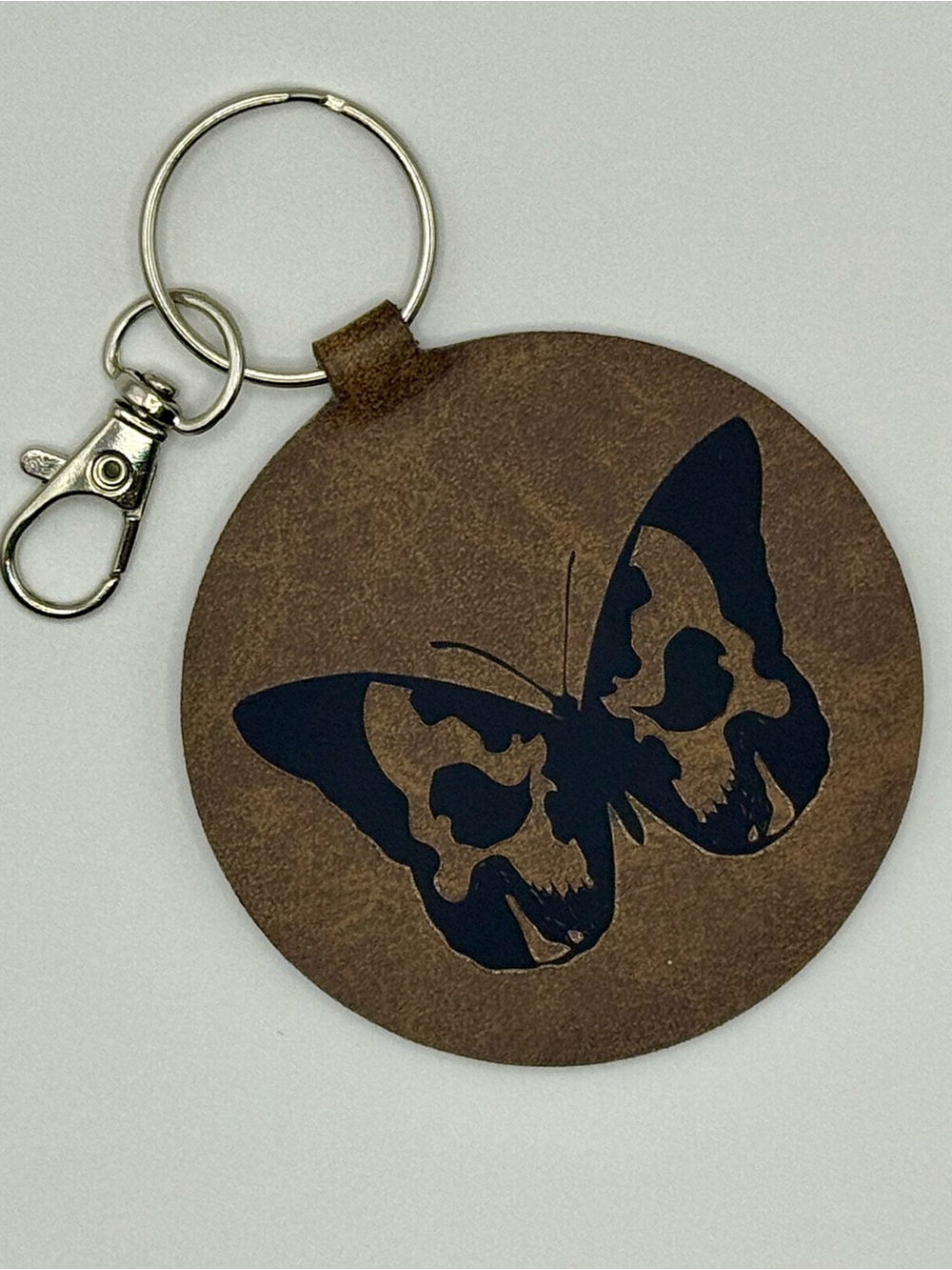 Round Leather Butterfly Keychain in Brown and Black